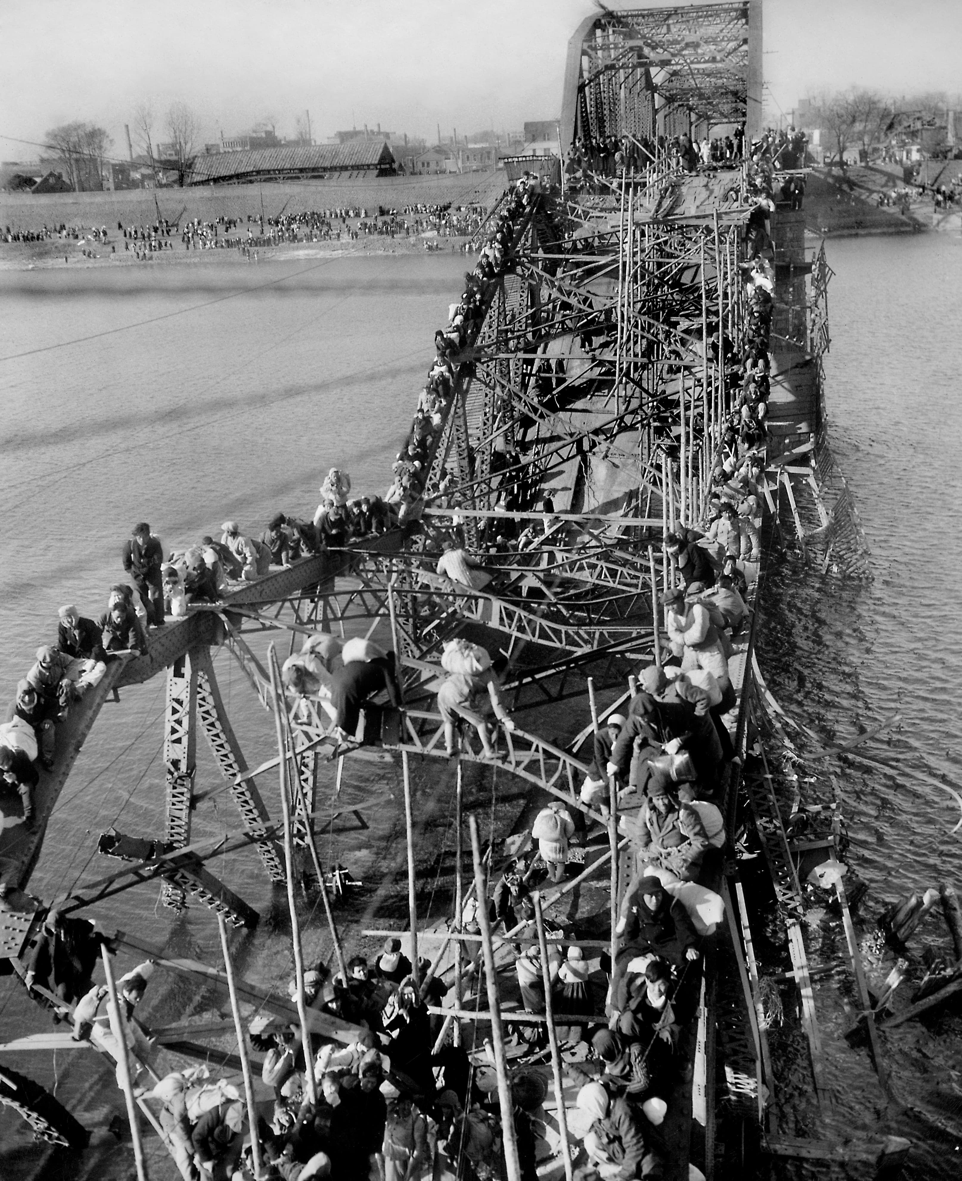 Flight of Refugees Across Wrecked Bridge in Korea Flight of Refugees Across Wrecked Bridge in Korea
